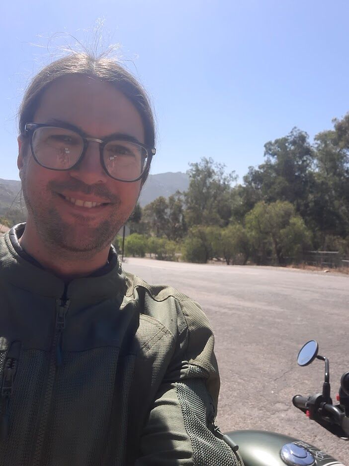 Selfie of author taking a break after a long ride.
